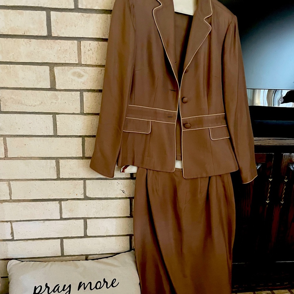 Beautiful suit from Dillards.  Fully lined jacket and skirt.